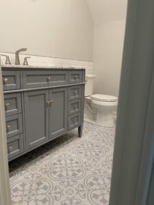 Grey Vanity and Designer Tile Floor